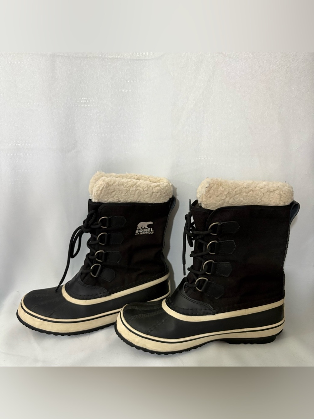 Sorel Women’s Black and Cream Insulated Lace-Up Snow Boots